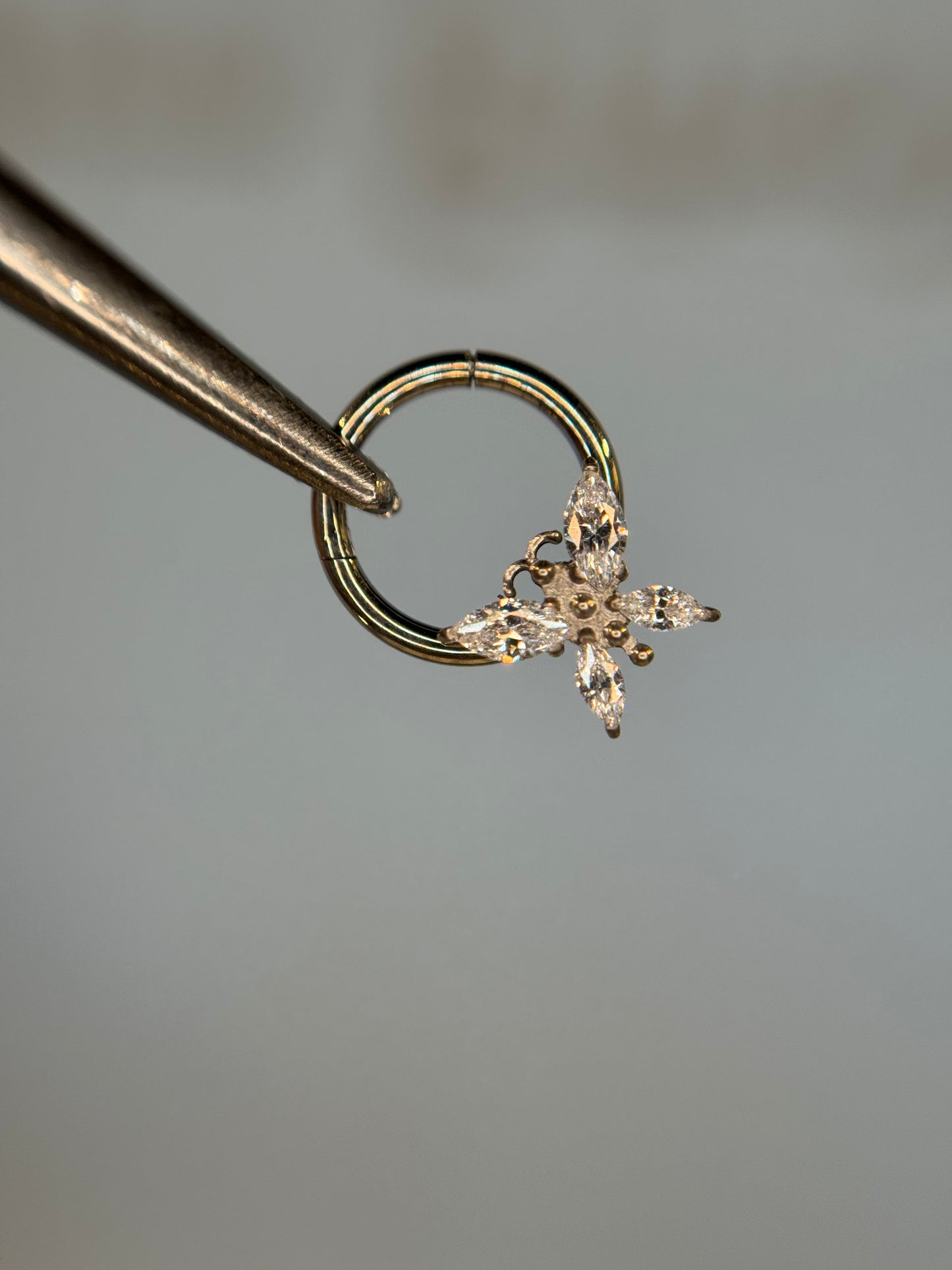 Butterfly titanium clicker
