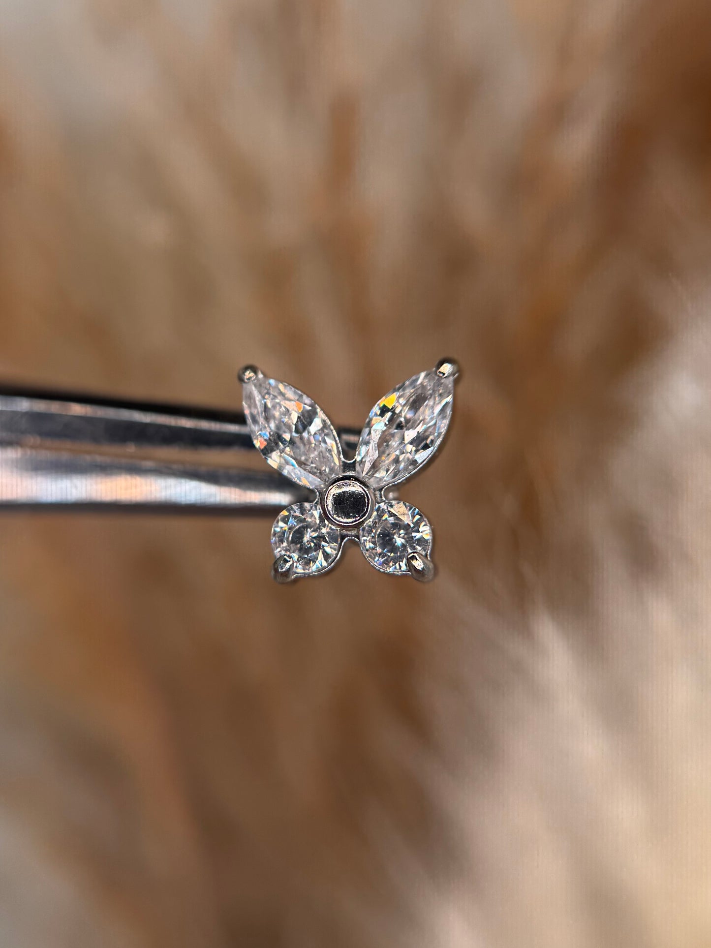 Butterfly dermal top
