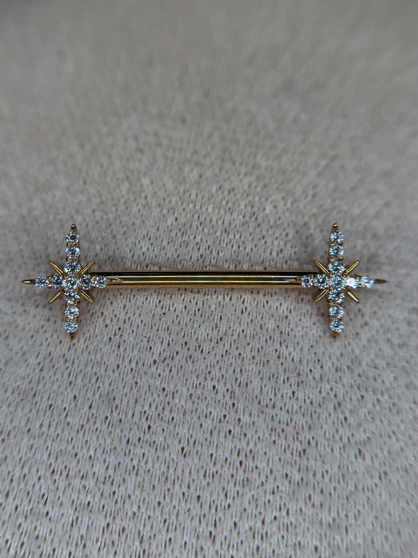 Star nipple bar